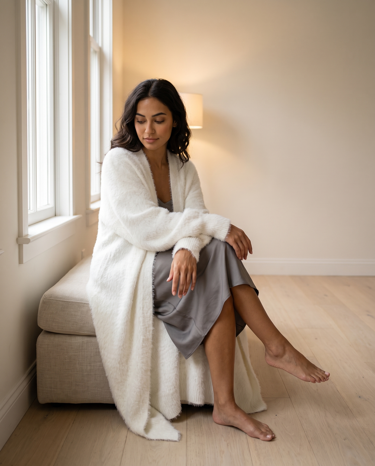 Neve Cardigan worn seated in soft window light