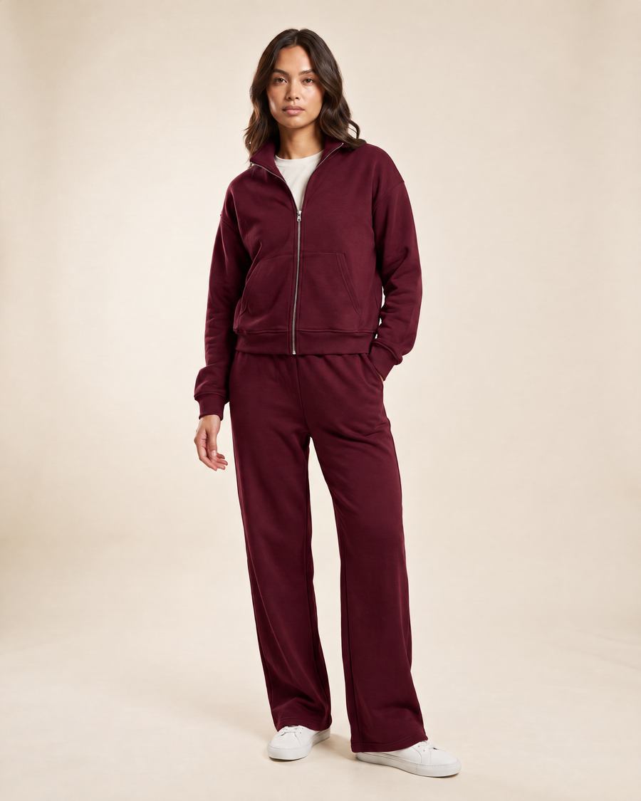 Elva Zip Set in burgundy, shown full length on an ivory studio backdrop